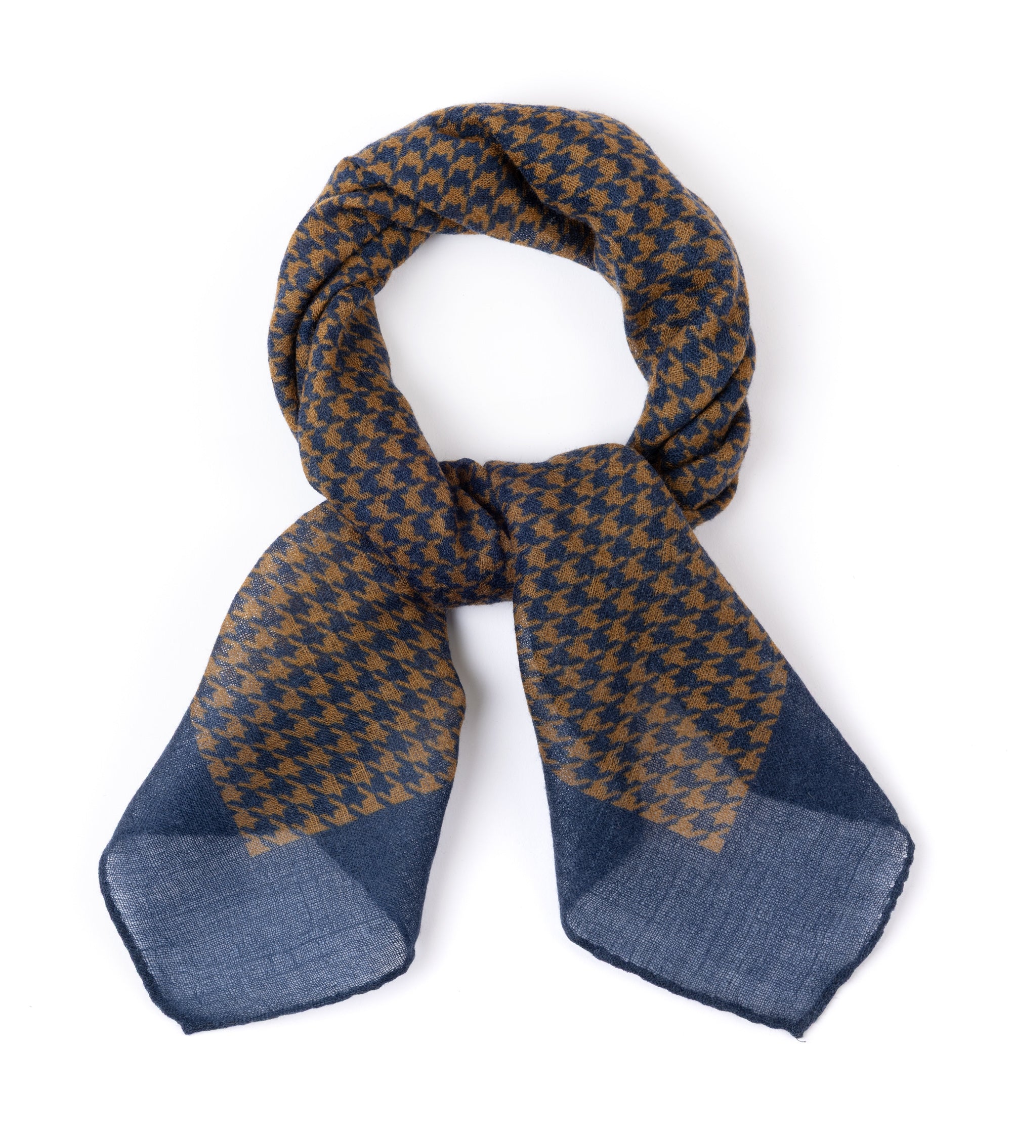 A blue and yellow houndstooth scarf, styled in a loop on a plain white background.