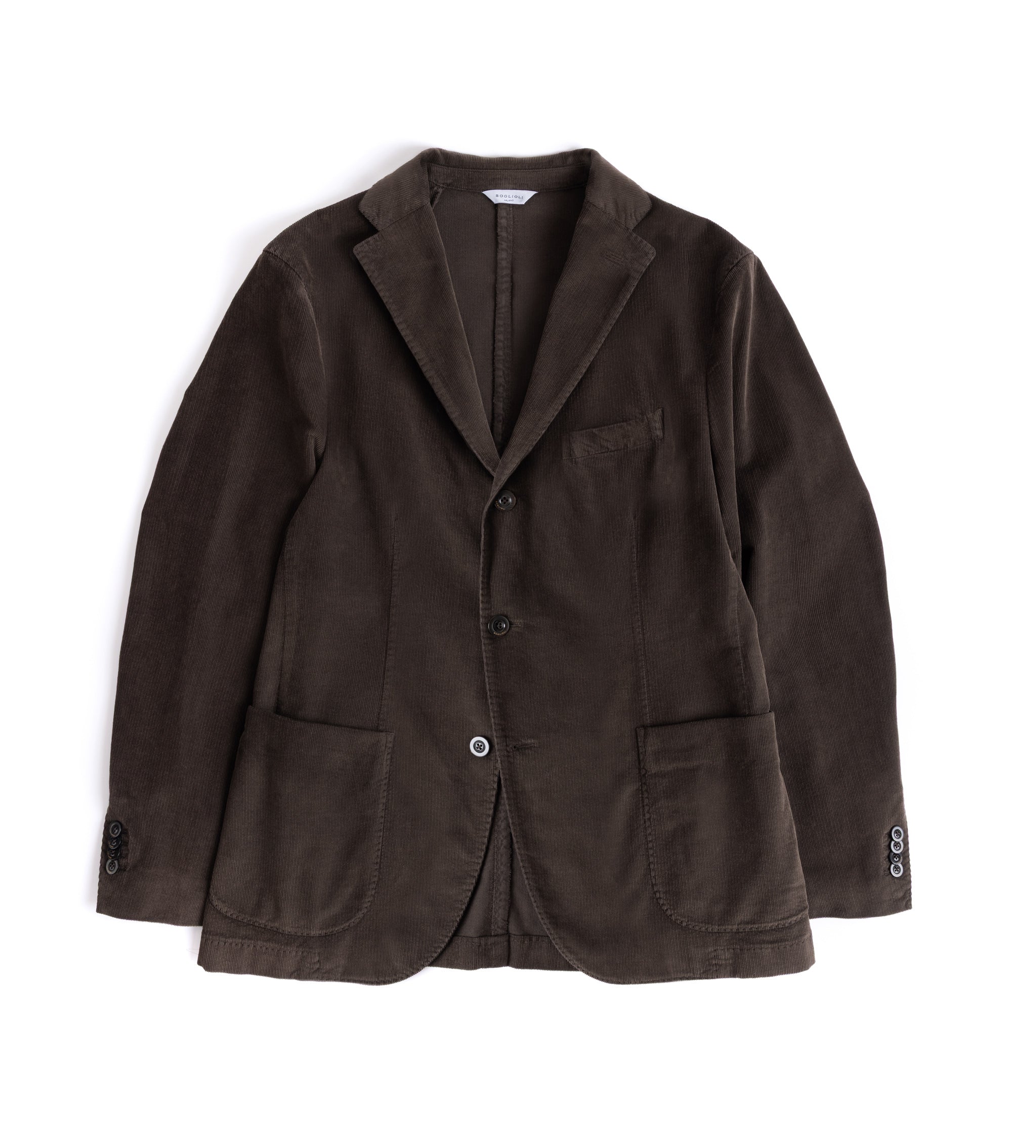 A dark brown corduroy blazer jacket with notch lapels, button front closure, and two front patch pockets, shown flat on a white background.