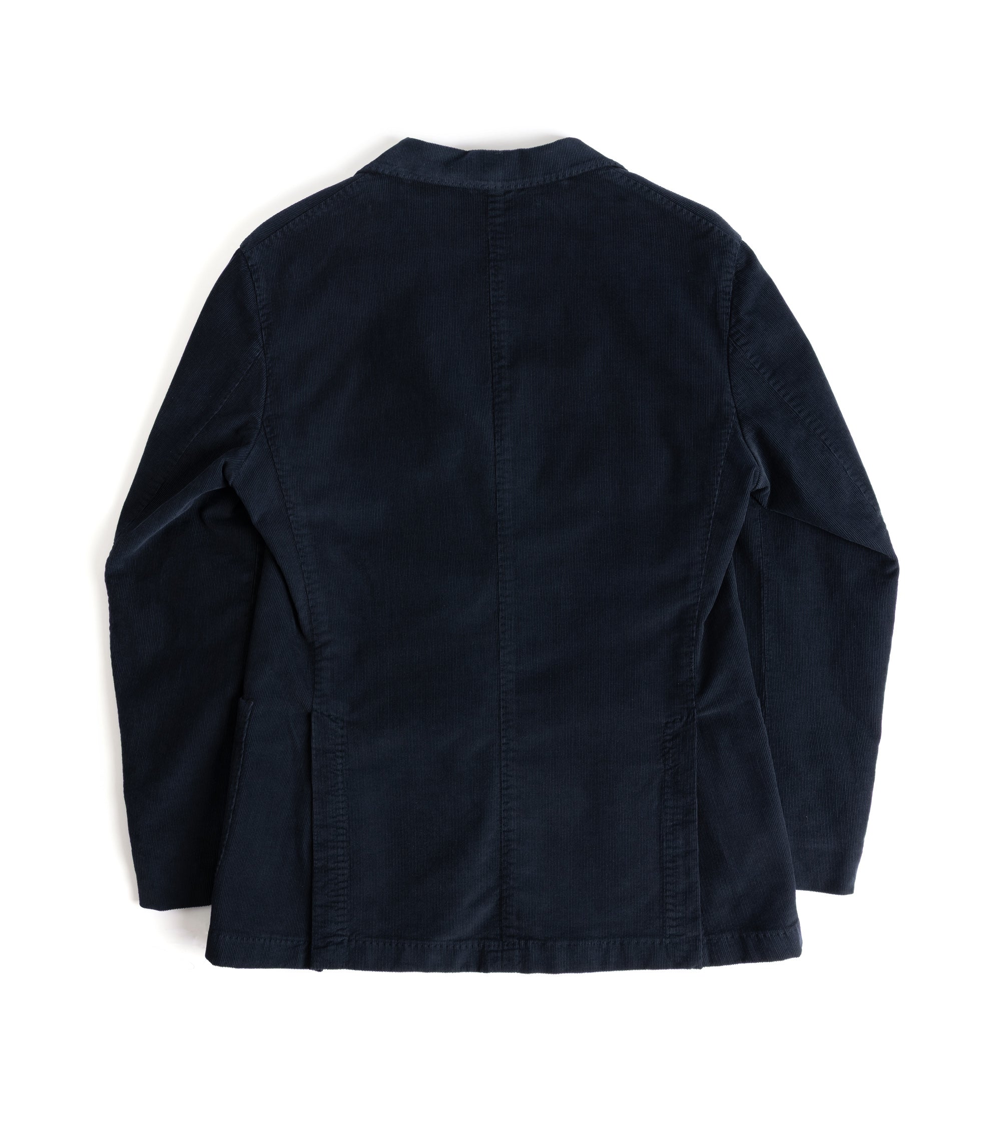 A dark navy blue corduroy jacket shown from the back, laid flat against a clean white background.