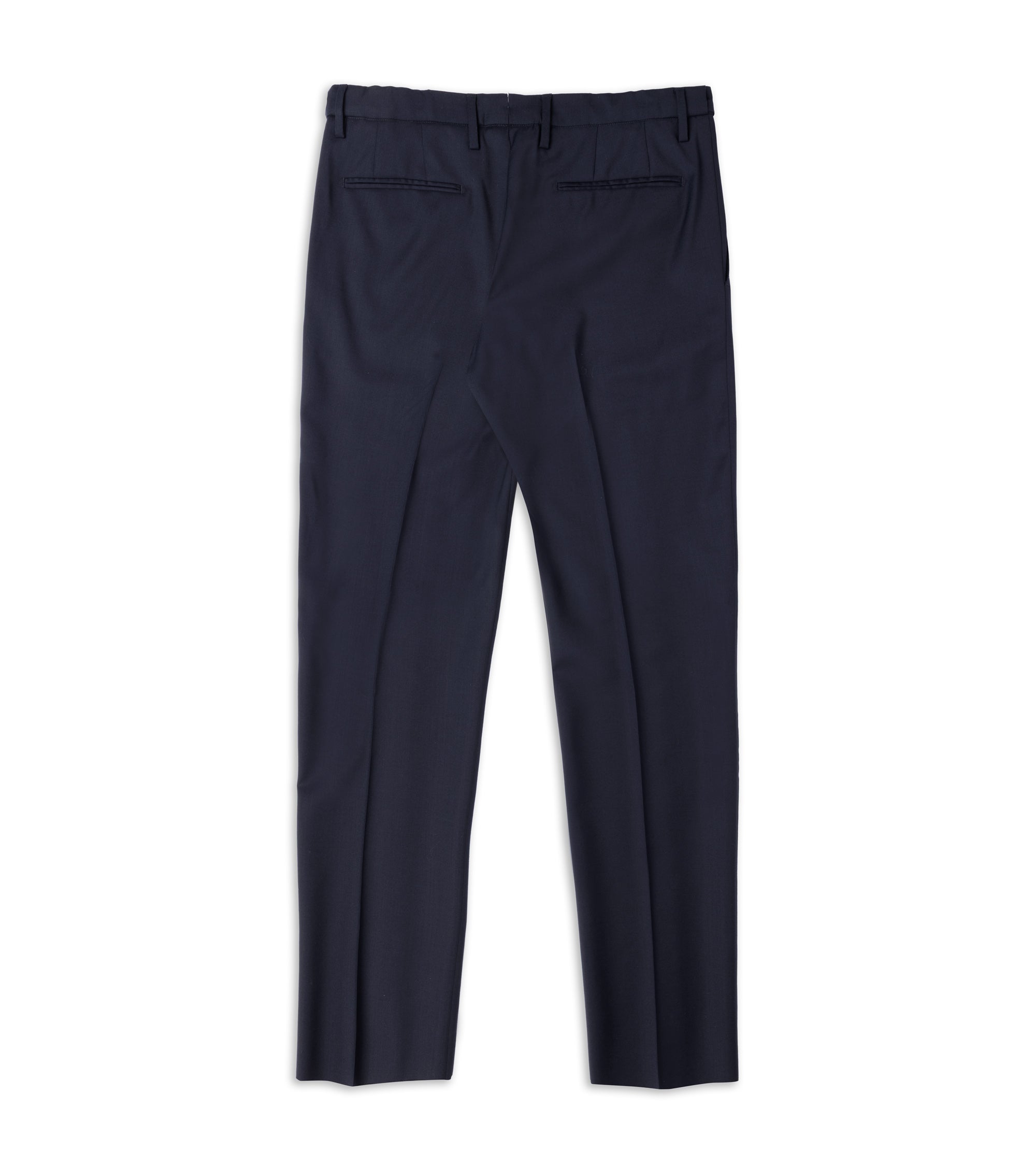 A pair of dark navy blue trousers shown from the back, featuring belt loops, and two welt back pockets, laid flat against a solid white background.
