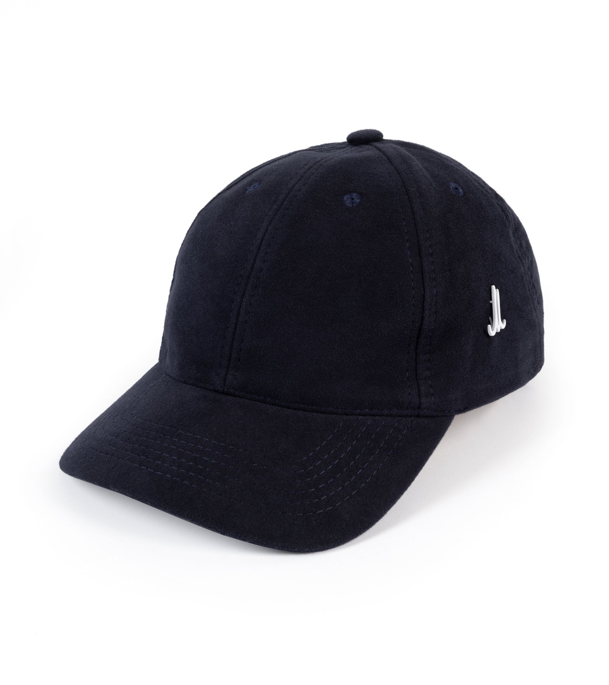 A dark navy blue baseball cap with a small white pin logo on the side, photographed on a clean white background.