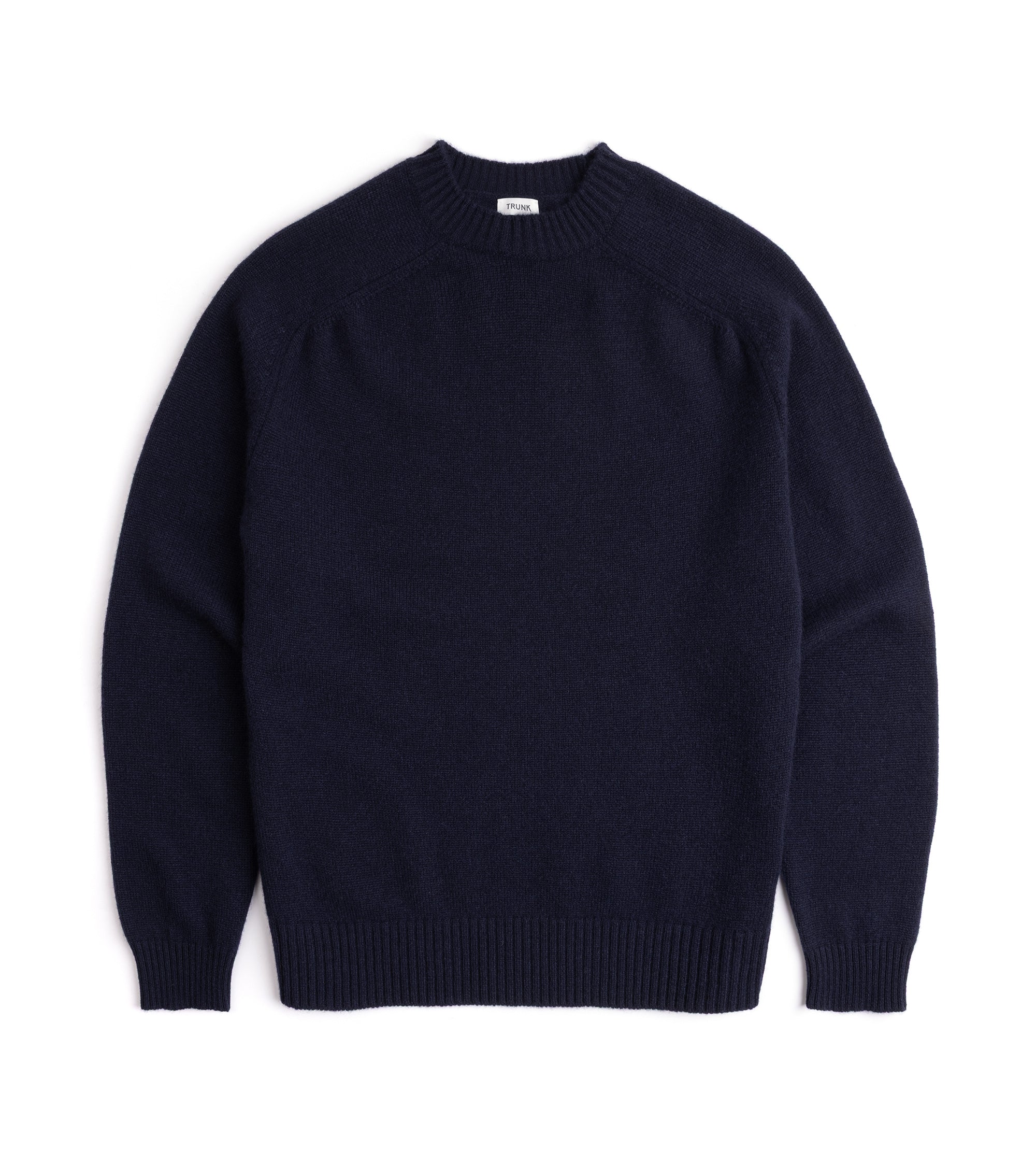 Navy blue sweater on a white background