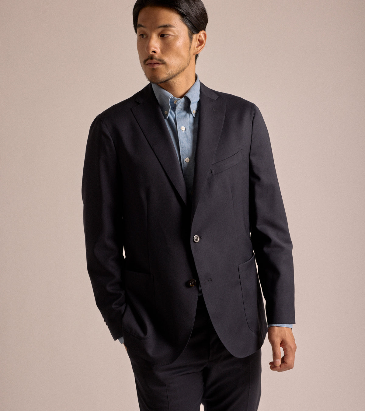 Boglioli Lightweight Wool Travel Suit in navy, product photo.