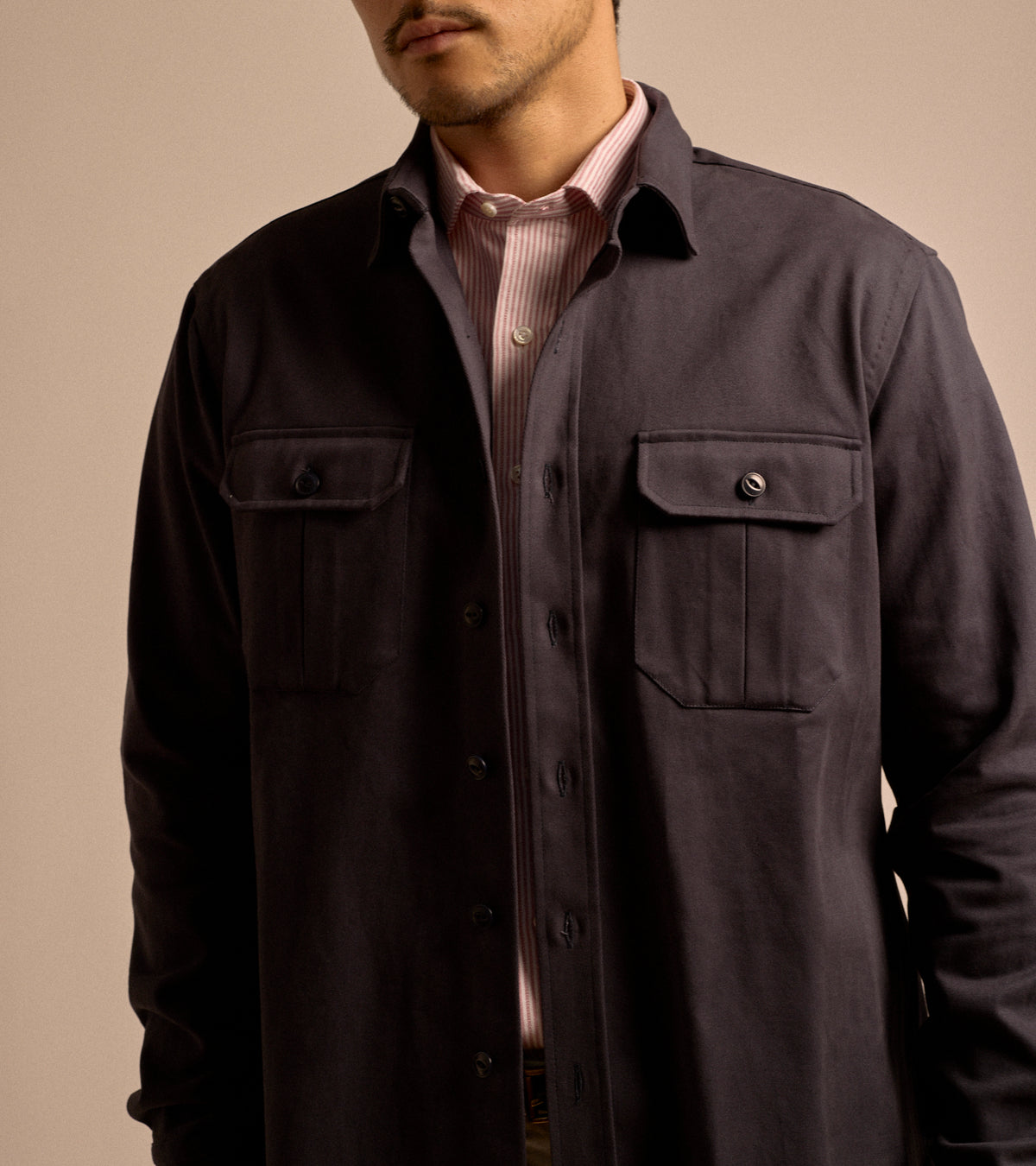 Model wearing the Salvatore Piccolo Cotton Twill Military Shirt in navy, styled with a Salvatore Piccolo shirt in red and white stripe.