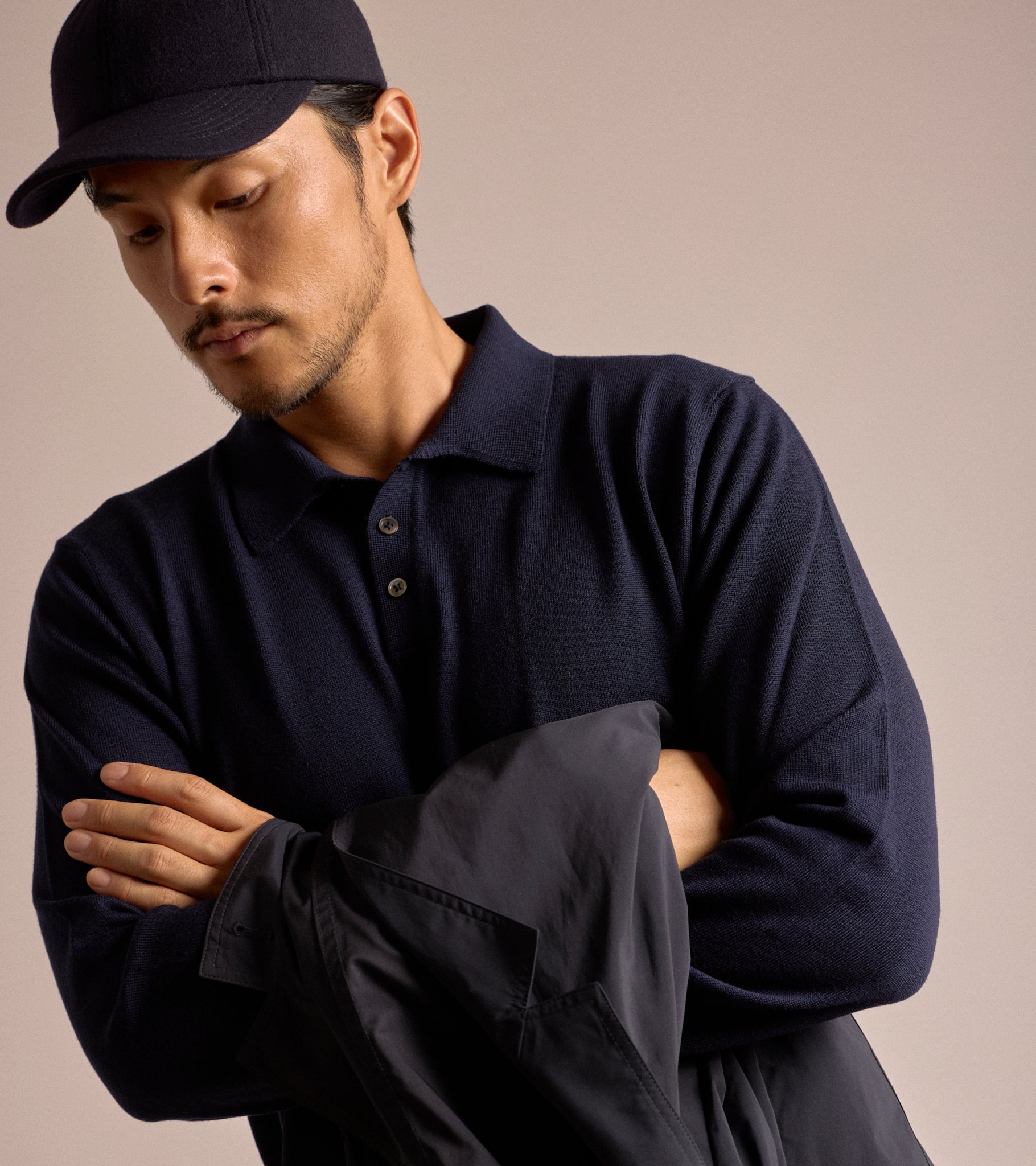 Trunk Enford Merino Knit Long Sleeve Polo Shirt in navy, product photo.