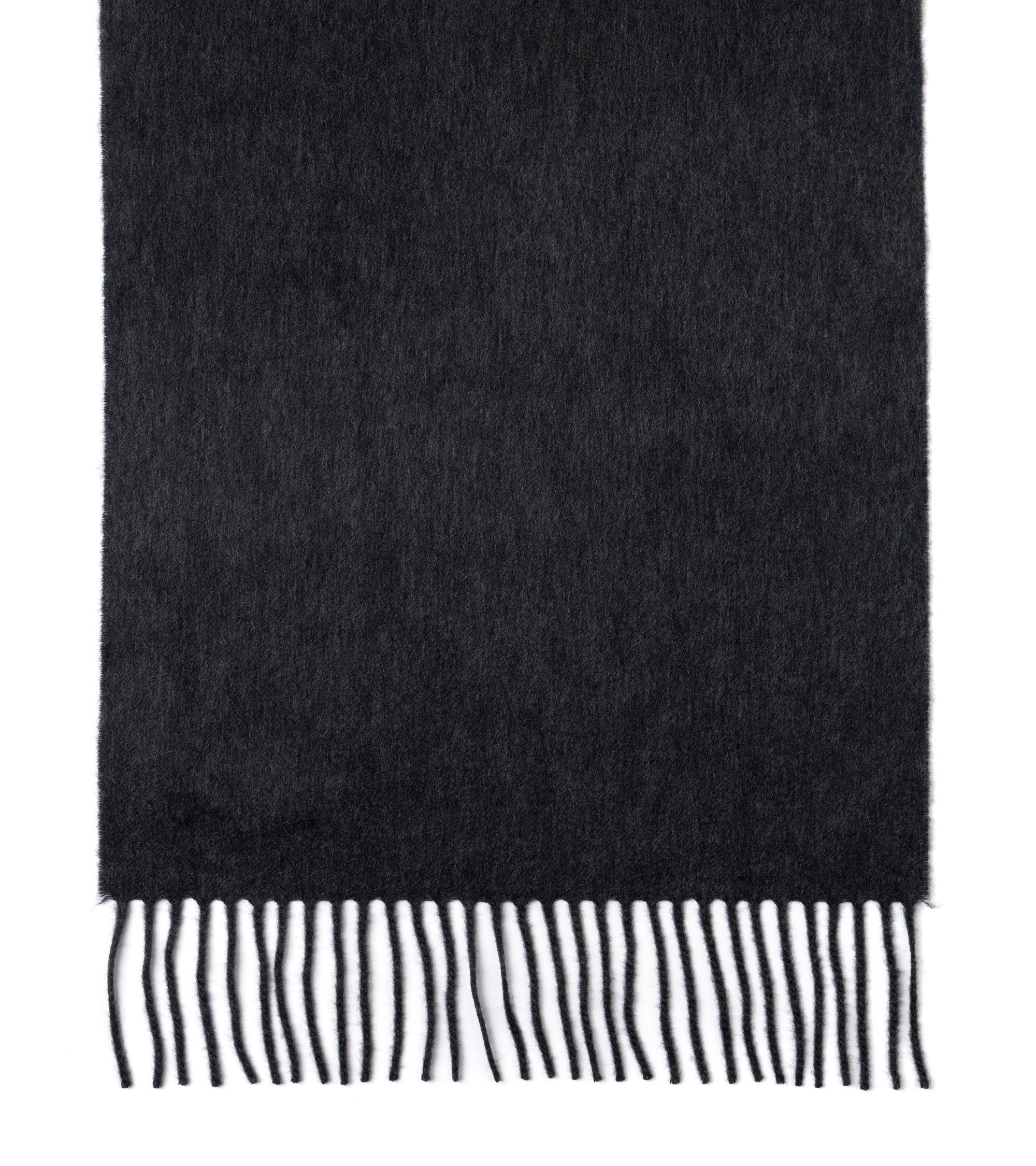 A dark charcoal gray woven scarf with fringed edges, shown flat against a plain white background.
