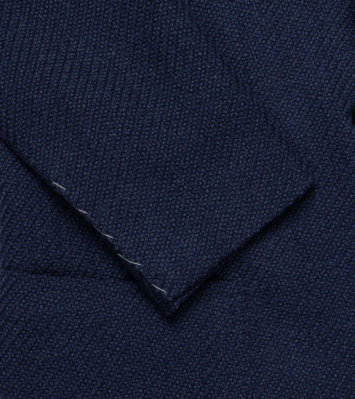 Close-up of the Ring Jacket Meister Wool Roving Kersey Balloon Jacket in Navy showing the texture, weave detail and cuff.