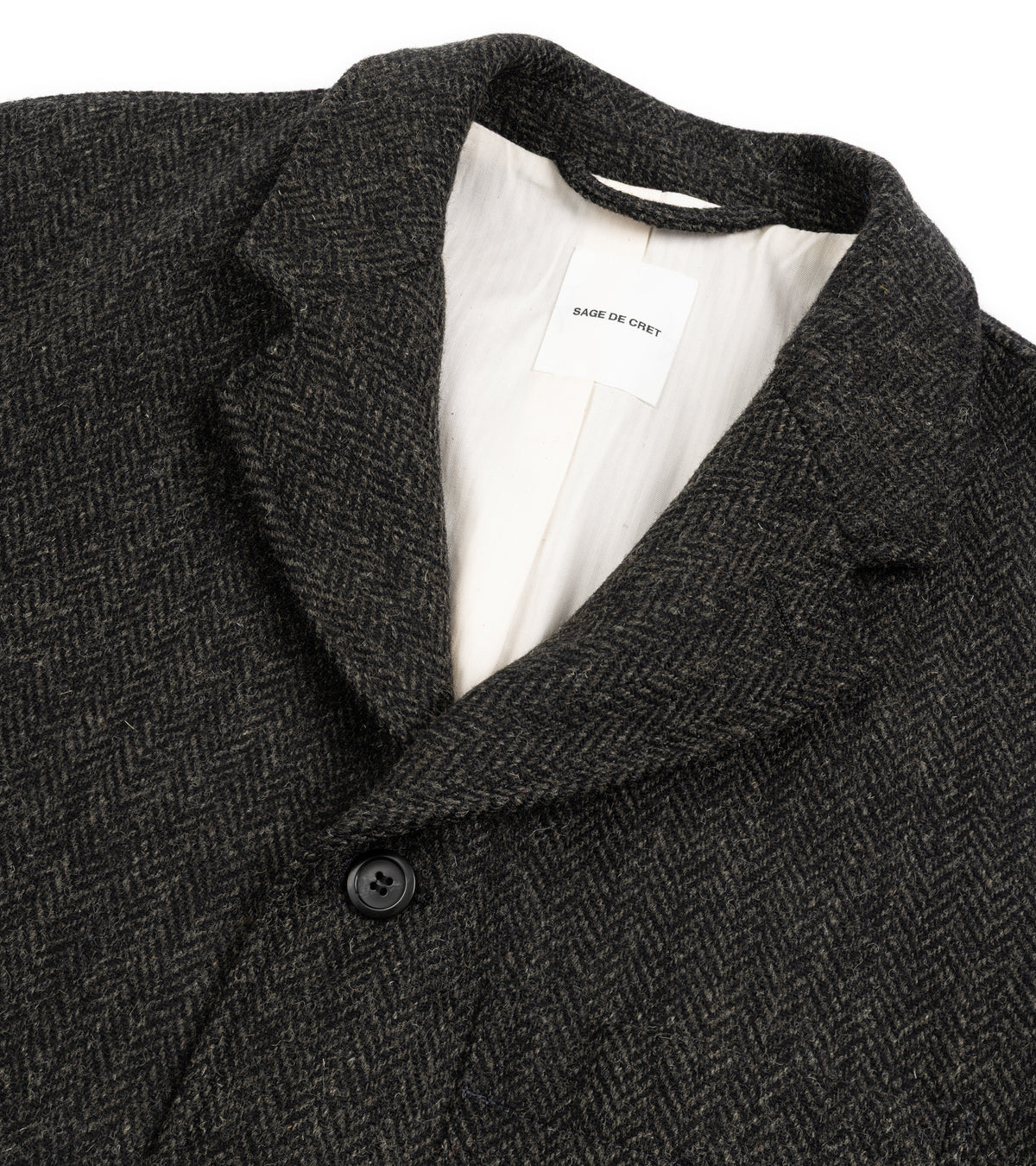Sage de Cret Harris Tweed Four-Button Coverall Jacket in grey, close-up detail of the collar.