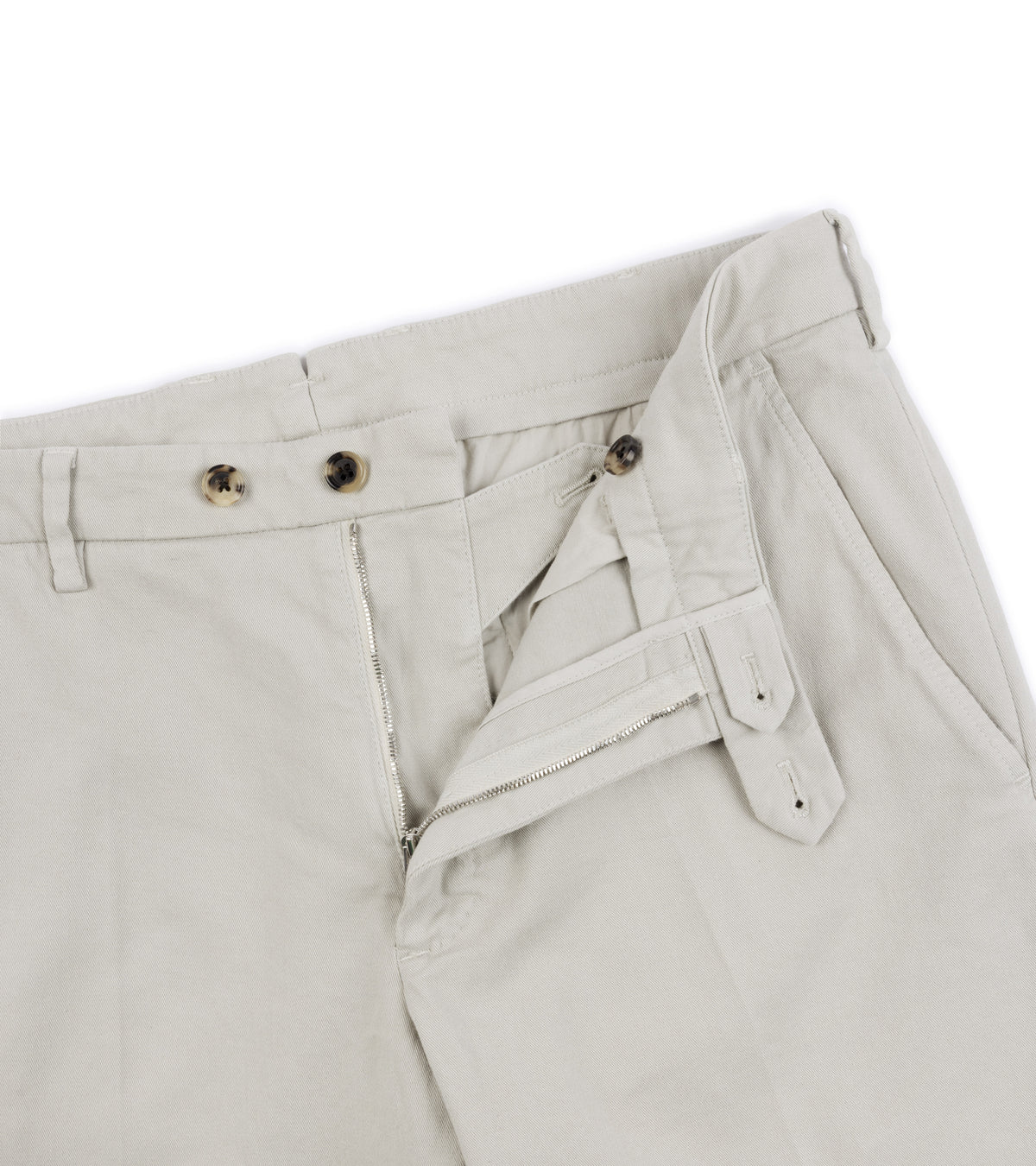 Close-up of the Trunk Palmer Flat Front Cotton Twill Trousers in Greige showing the waistband, belt loops, front zipper.
