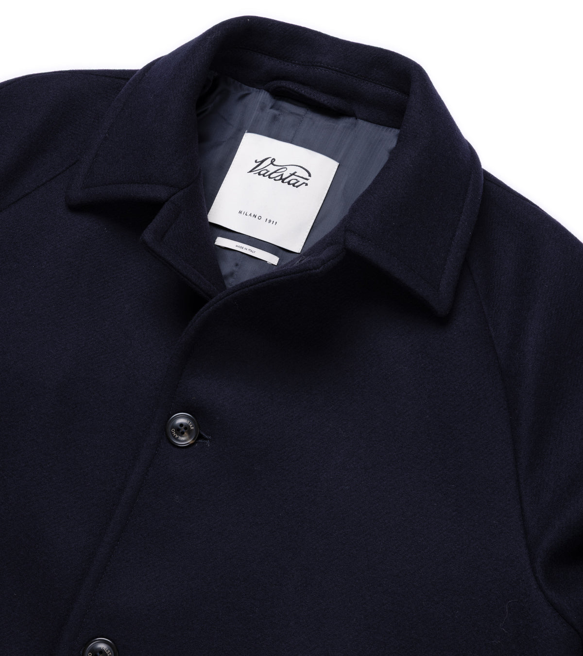 Valstar Vittorio Wool Felt Raglan Overcoat in Navy. Close-up detail of the collar with the top button undone.