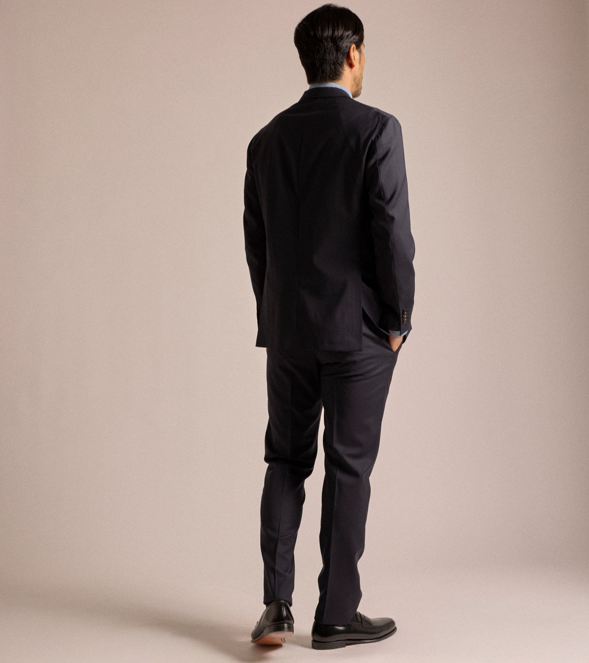 Boglioli Lightweight Wool Travel Suit in navy, product photo.
